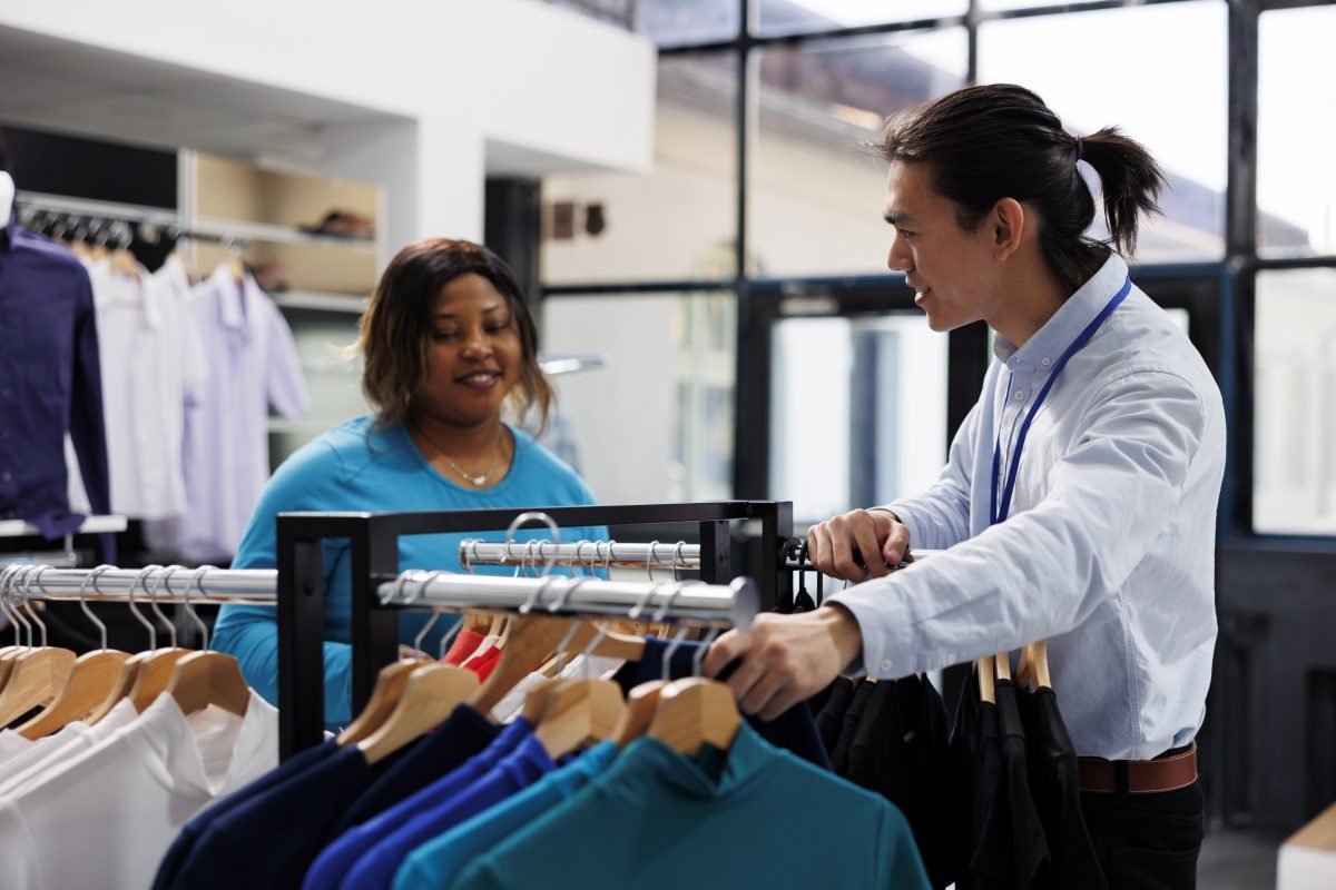 African american customer looking casual wear shopping stylish merchandise modern boutique shopaholic woman wanting new wardrobe buying fashionable clothes clothing store copy