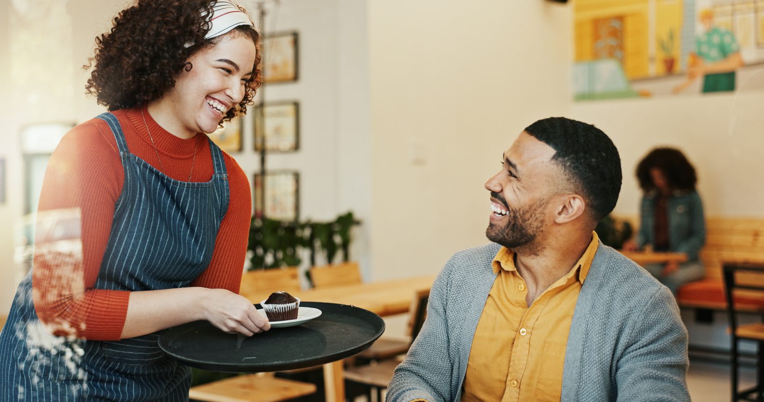 Hospitality customer waitress cafe with cake client order smile table barista woman man service restaurant sweet treat small business local support coffee shop copy
