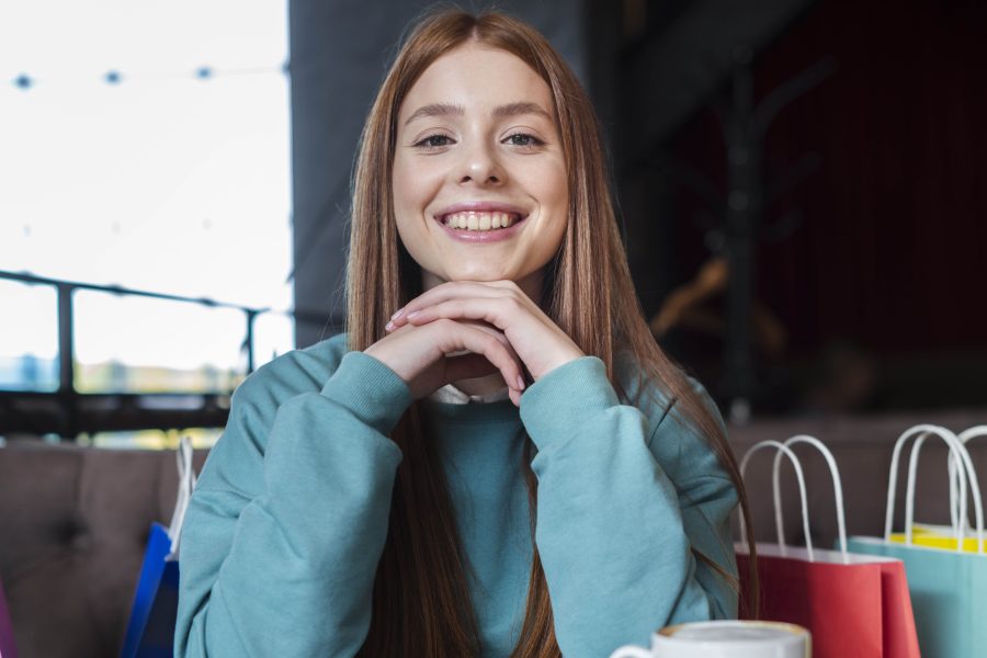 Portrait smiling woman looking photographer copy2