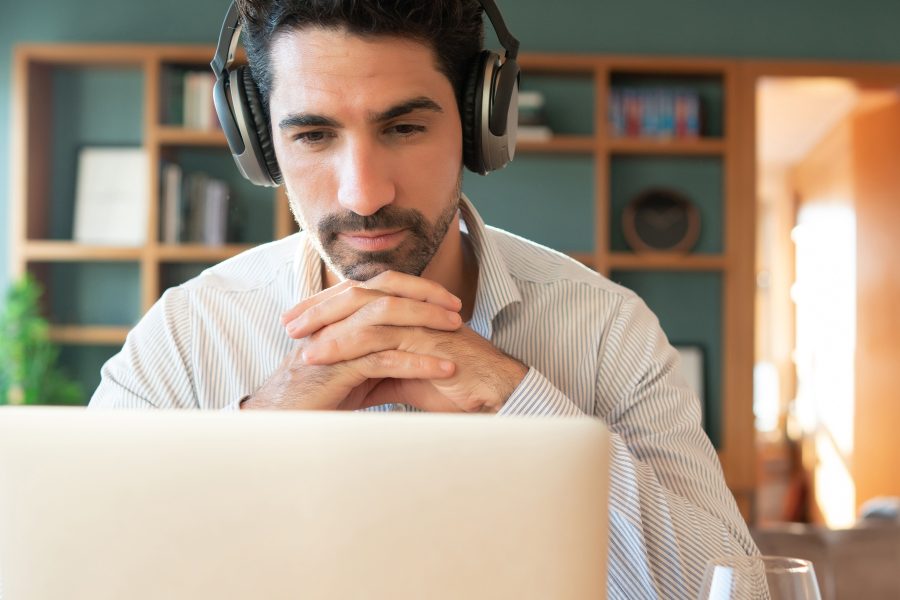 Portrait young man work video call with laptop from home home office concept new normal lifestyle copy
