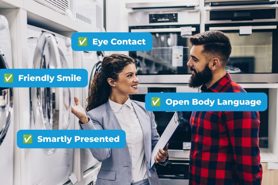 Young man buying washing machine appliances store copy