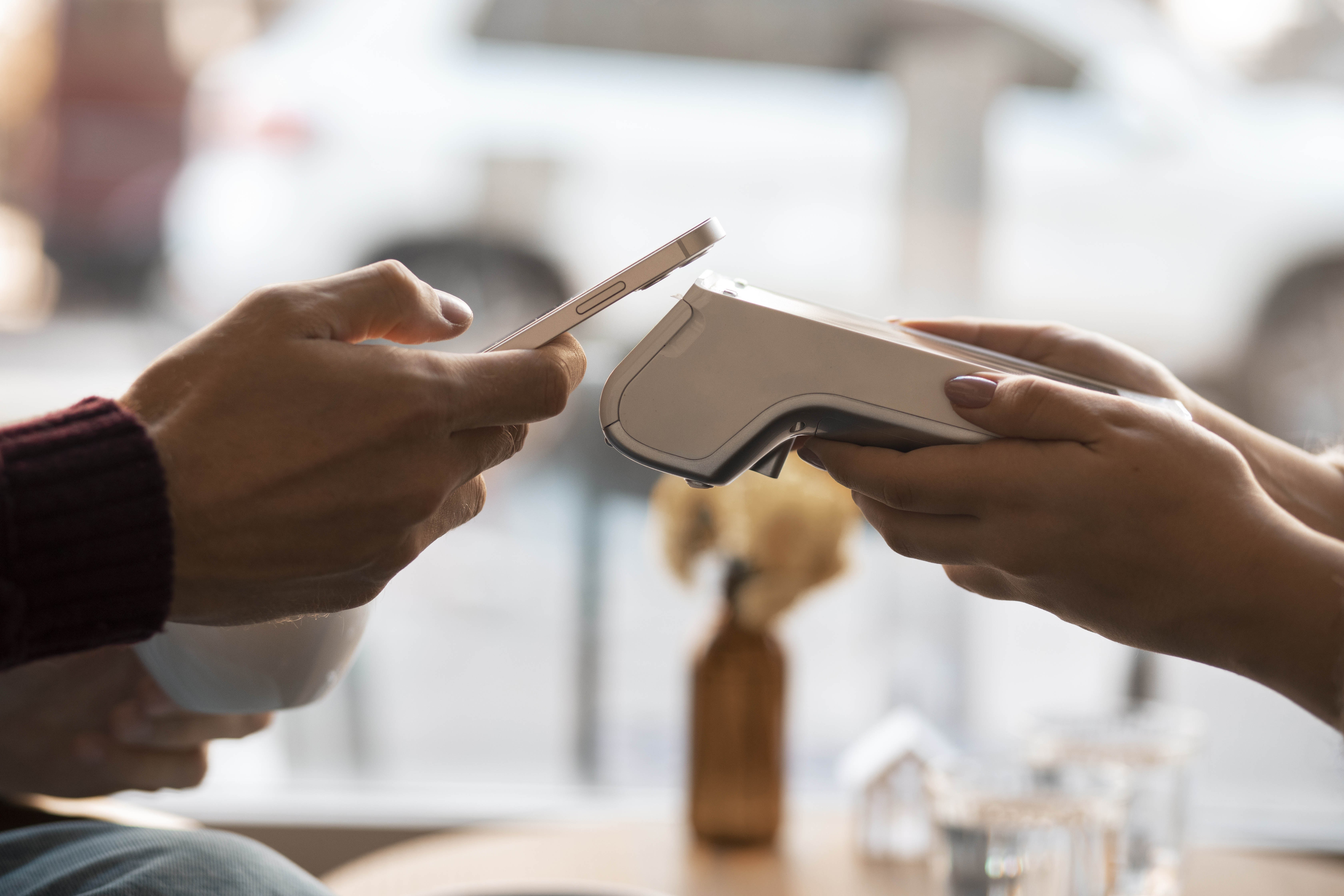 Person using nfc technology pay bill restaurant copy